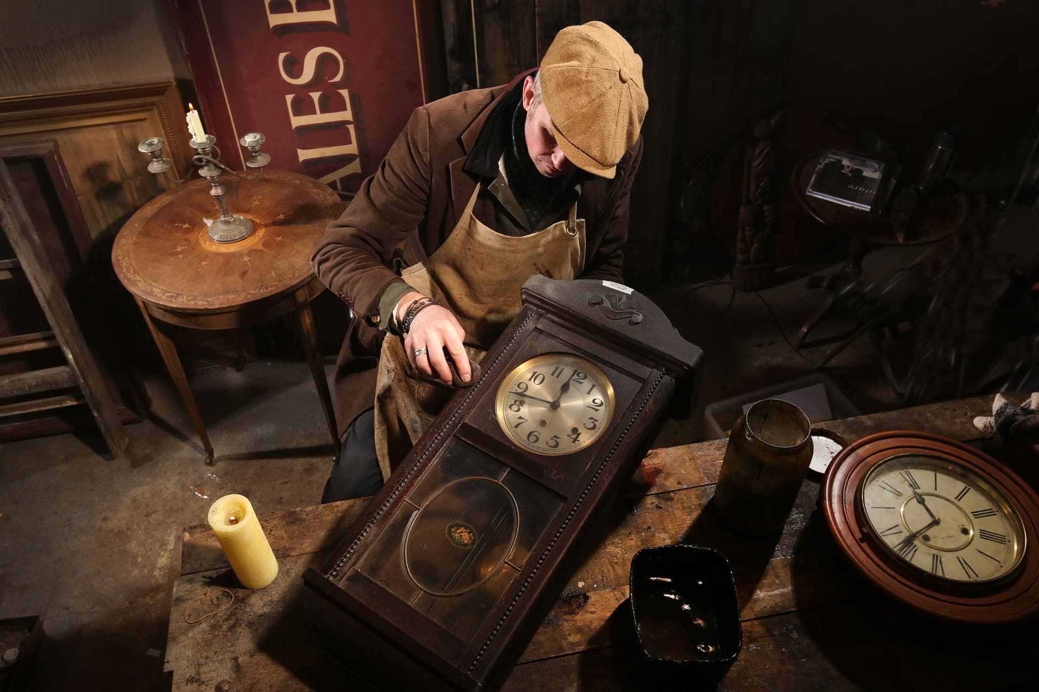 Rob Cain working on an antique clock restoration with specialised tools
