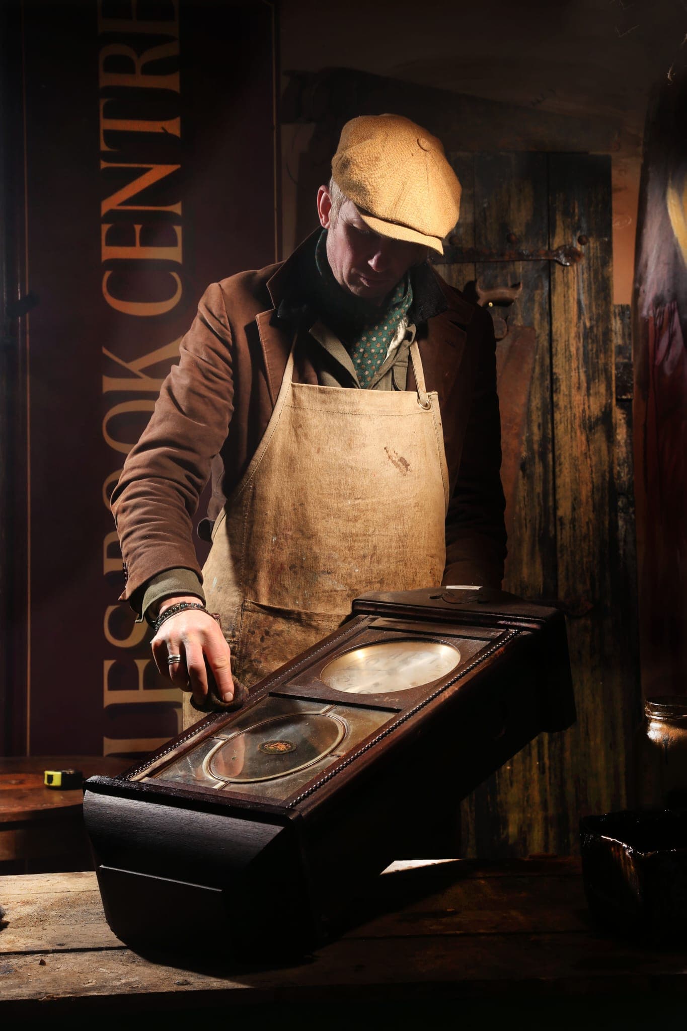 Rob Cain restoring an antique clock in The Old Polishing Shop